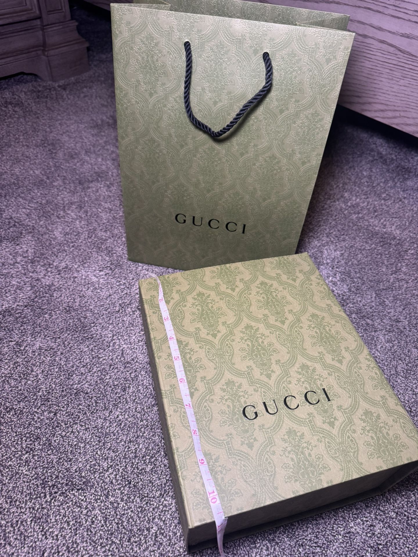 Empty New Gucci box and paper bag