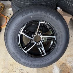 New 205-75-14inch Traiier Tires With Black Aluminum Wheels.  