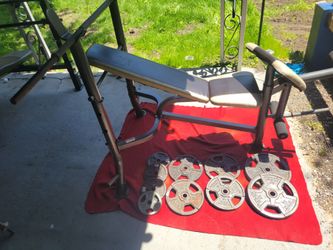 MARCY BENCH WITH INCLINE.  LEG EXTENSION PREACHER PAD 
1" HOLE  PLATES TOTAL 110LBs  
2-25s.  4-10s  4-5s.  
5' STRAIGHT BAR.
11525 S HALSTED DUNKIN/7