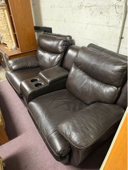 Used double reclining sofa with console middle