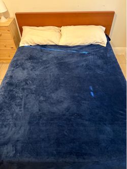 Cama matrimonial de madera