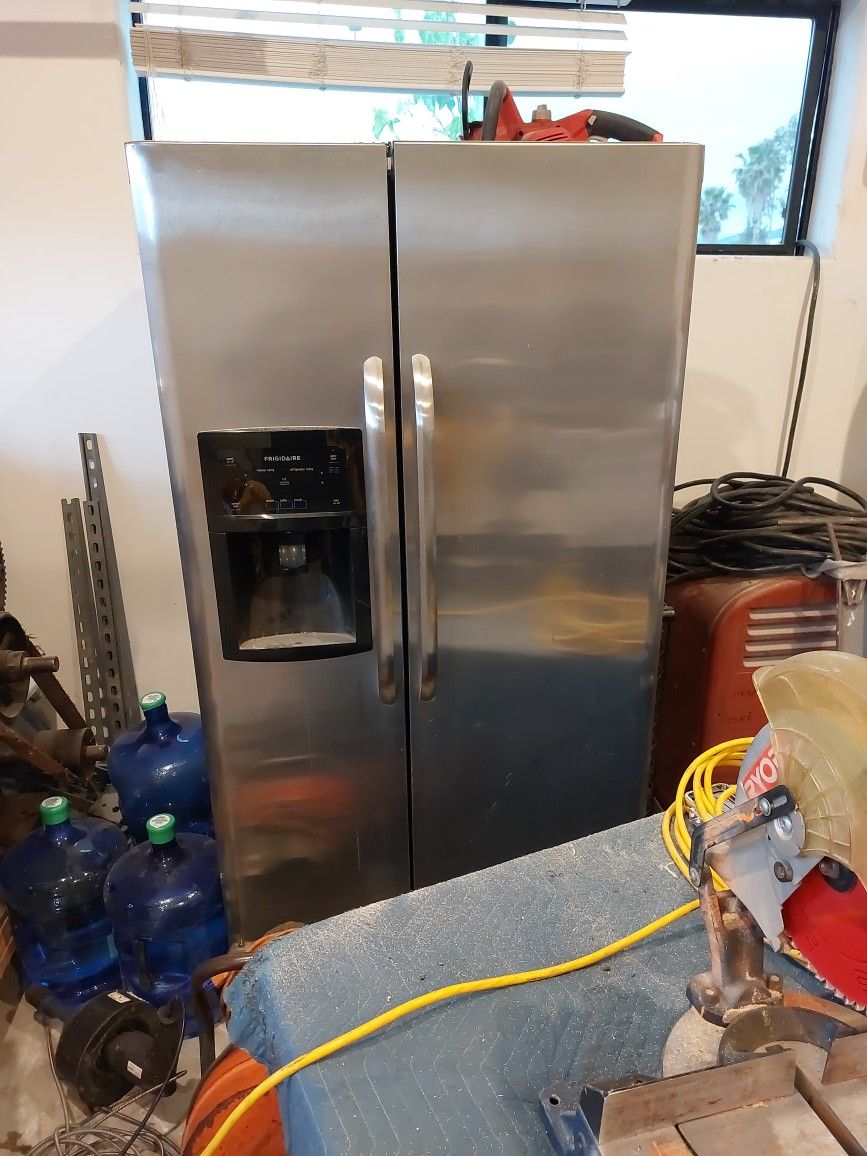 Frigidaire Refrigerator And Freezer $325
