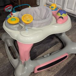 Storkcraft 4-in-1 Activity Walker and Rocker With Jumping Board