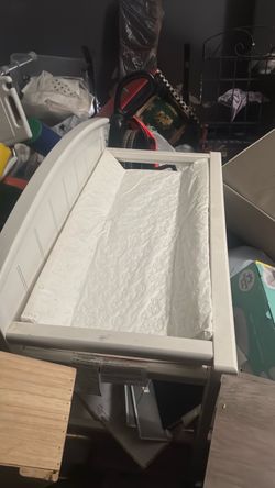 White changing table. New changing pad.