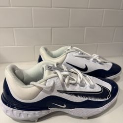 This is a pair of Nike Alpha Huarache Elite 4 Low men's baseball cleats New Without Box Size Men’s 10 1/2 
