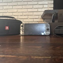 Game, nintendo switch, It Will Come With Games, It’s Black And Gray.