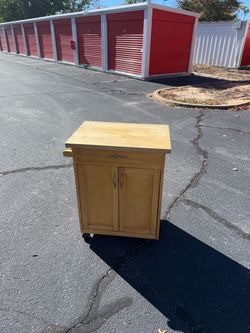 Rolling kitchen cart with drawer and cabinet