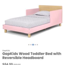 New Baby Gap pink wood toddler bed frame (Mattress not included)