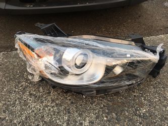 Headlight R/H New.... never used