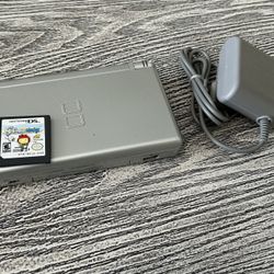 Silver Nintendo DS Lite with ScribbleNauts game, complete with charger. $65
