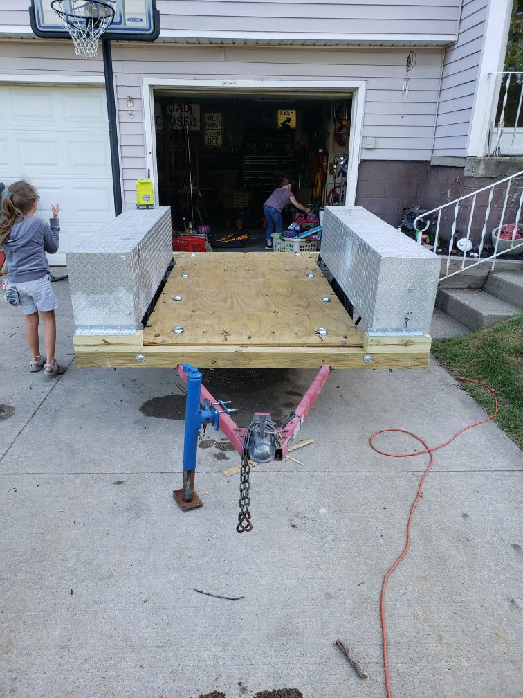 Trailer with ramps and truck boxes