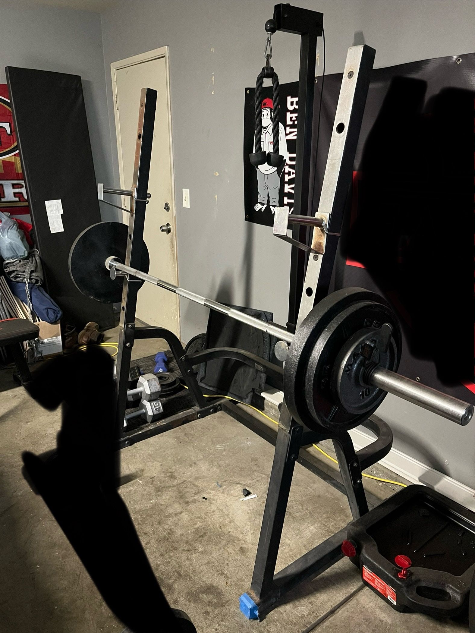 SQUAT RACK / BENCH PRESS / PULLY SYSTEM. WITH 240 LBS OF WEIGHTS