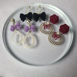 3 cute earrings with bow and rose charms