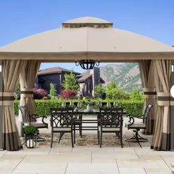 Patio Gazebo 11 ft. x 13 ft. with LED Lights and Bluetooth Speaker, Netting and Curtains, Brown
