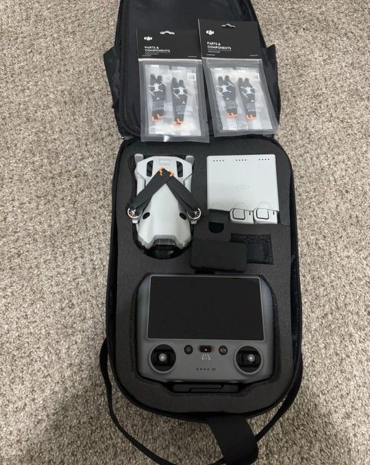 DJI Mini 4 Pro with Fly More RC2 Combo Kit Three 249g Batteries Backpack + More