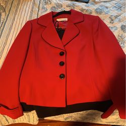 red pinkish blazer/suit