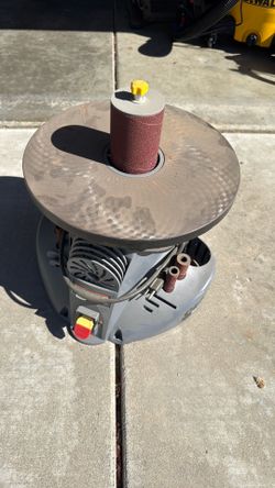 Oscillating spindle sander