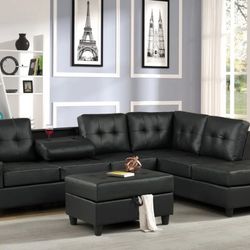 Heights Black Faux Leather Reversible Sectional with Storage Ottoman