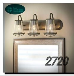Georgina 24 in. 3-Light Matte Black Industrial Rustic Vanity with Clear...