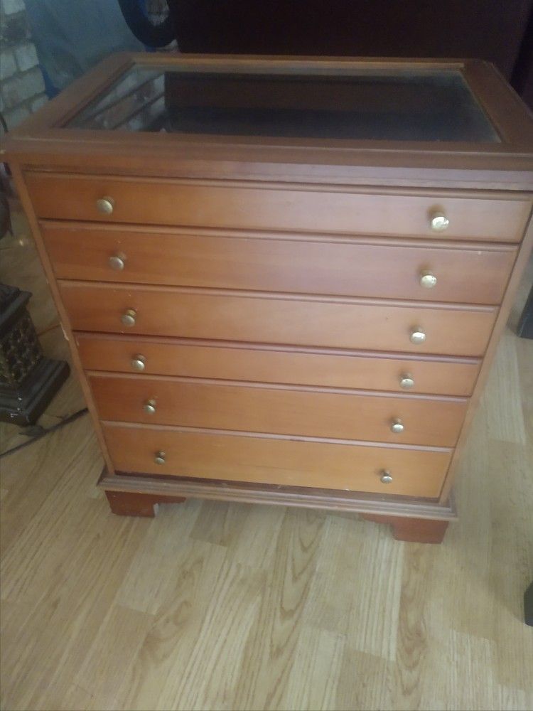 Lockable Six Drawer Storage Chest With Glass Display Top And Hidden Compartment