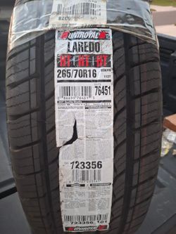 TIRE - UNIROYAL LAREDO 265/70R16 HT  (112T all season)