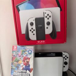 Nintendo OLED Switch With 4 Games