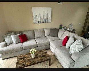 Beautiful beige sectional couch from Jerome’s