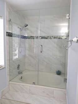 Glass showers doors and panels.