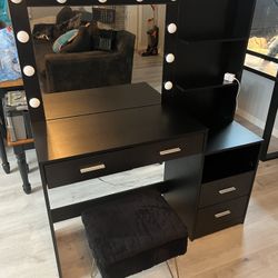 black vanity and stool. 