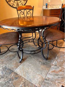 REDUCED TO SELL: STURDY Kitchen table and 4 chairs