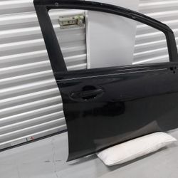 2014-2019 Nissan Versa. Passenger Door $160
