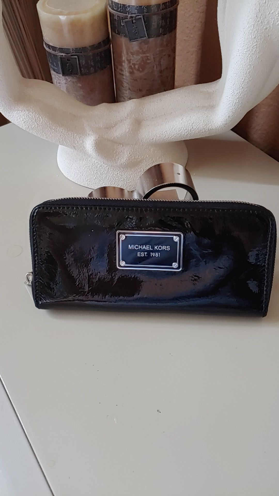 MK patent leather wallet