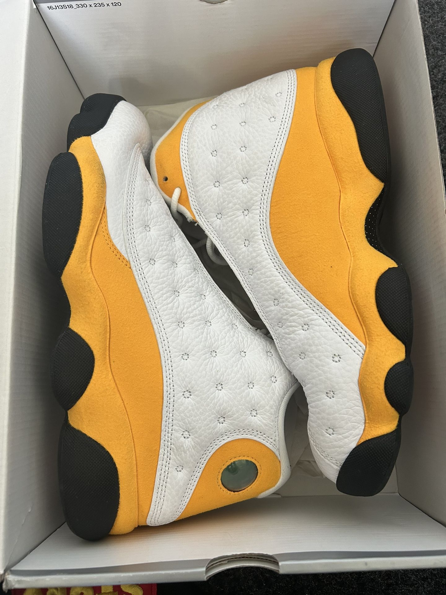 Yellow white Jordan 13s