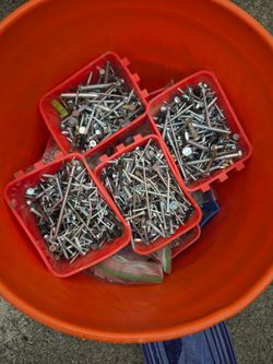 Bucket of misc. screws, nails, nuts, bolts, wall anchors