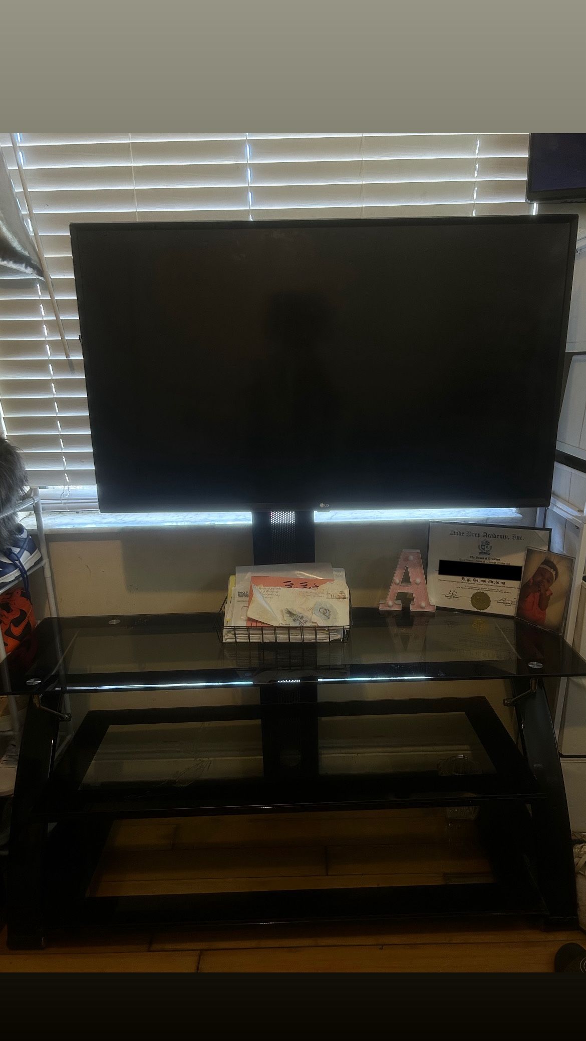 LG TV with glass TV stand