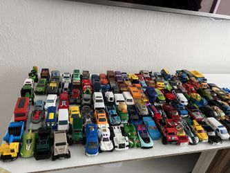 Assorted Hot Wheels And Cars And Trucks