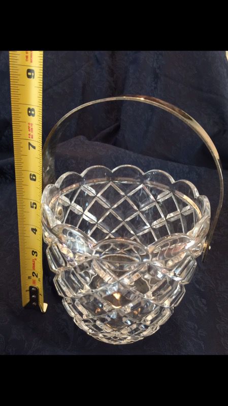 Glass bucket, silver metal handle and cross cut glass shape. May be crystal?