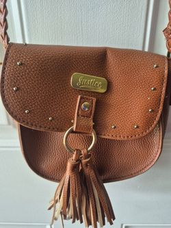 Brown leather Justice purse