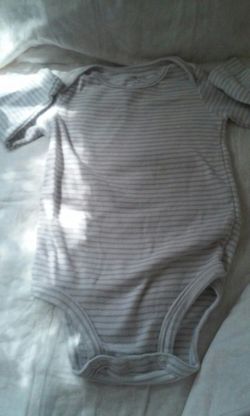 Carter's onesie.9 mo.