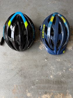 2 bicycle helmets Giro