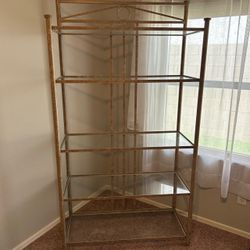 Solid metal stand with glass shelves
