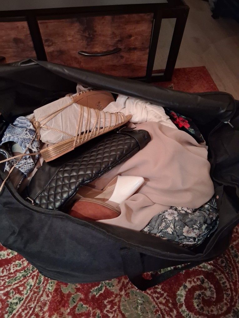 Giant, Demure, Classy Duffle Bag Of Women's Clothes.