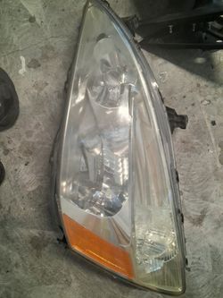 2015 nissan rogue left front headlight