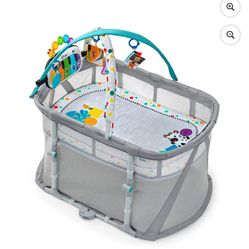 Baby Einstein Kick & Snooze 3-in-1 Foldable Playard with Bassinet, Gym, and Bedside Sleeper