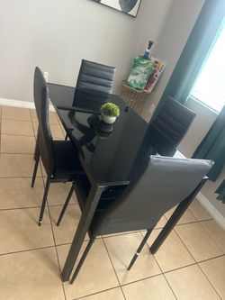 Black Dinning table w/ chairs
