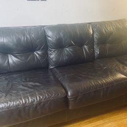 brooklyn area, black leather couch