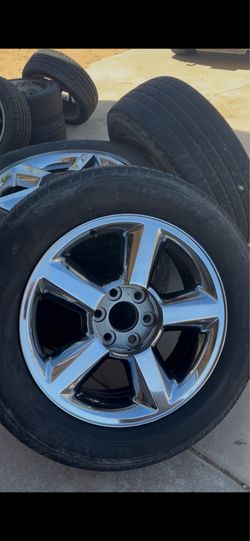 RIMS/ CHEVY Stock rims with tires