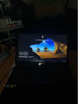used ASUS laptop (charger included)