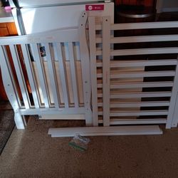 Brand New Never Used Aden 4in1 Convertible MIni Crib In Grey