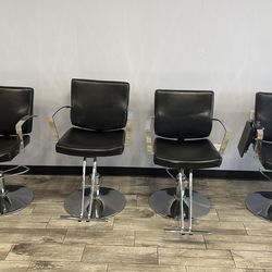$75 each. Four salon chairs.